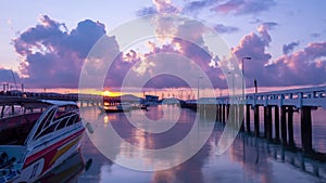 Phuket Thailand.Time Lapse Chalong pier during sunrise or sunset Amazing beautiful colorful dramatic sky over sea in Phuket thaila