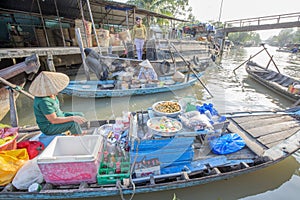 Phung Hiep floating market at seven-ways crossroads (Nga Bay), Can Tho city, Tien Giang