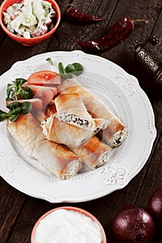 Phyllo pastry rolls with cheese and spinach