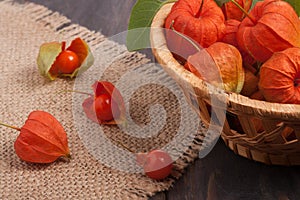 Physalis in a wicker basket on the table