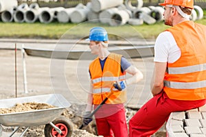 Physical labourers working outdoor photo