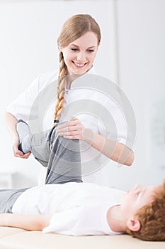 Physical therapist helping with exercises