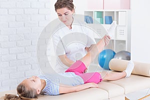 Physical therapy with child photo