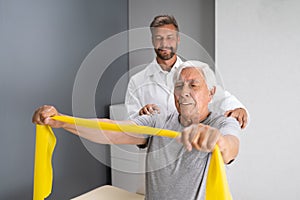 Physical Therapy Patient Using Physiotherapy Bands photo