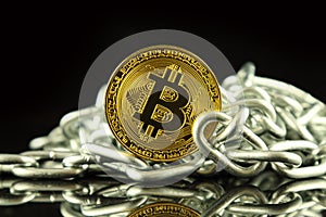 Physical version of Bitcoin new virtual money and chain. Conceptual image for investors in cryptocurrency and Blockchain Technol