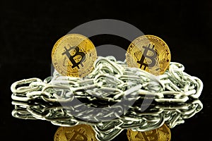 Physical version of Bitcoin new virtual money and chain. Conceptual image for investors in cryptocurrency and Blockchain Technol