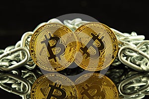 Physical version of Bitcoin new virtual money and chain. Conceptual image for investors in cryptocurrency and Blockchain Technol