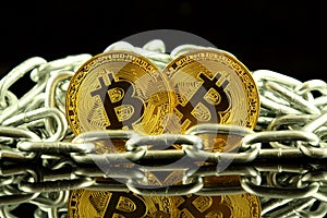 Physical version of Bitcoin new virtual money and chain. Conceptual image for investors in cryptocurrency and Blockchain Technol