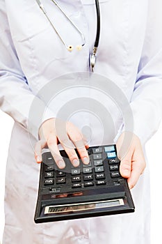 Physician calculates the cost of treatment