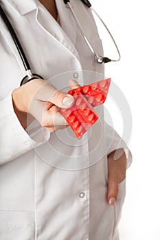 Physician giving pills