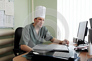 Physician in his office