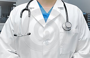 Physician man in scrubs with stethoscope
