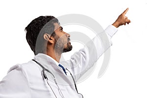 Physician pointing upwards from down angle