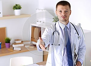 Physician ready to examine patient