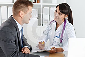 Physician ready to examine patient and help