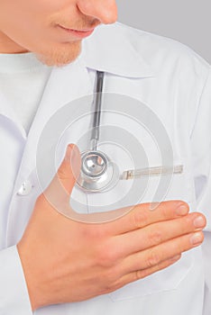 Physician is stroking his pocket with money