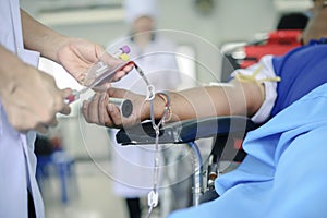 Physician during transfusion blood donation unit from donor