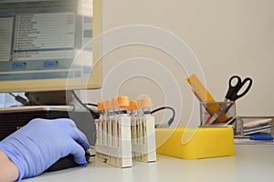 Physician using computer for examination stock photo