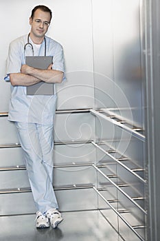 Physician Waiting In Elevator