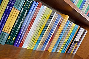 Physics books on the shelves in library