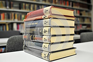 Physics books on the table in library