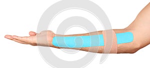 Physio tape on male arm, isolated on white