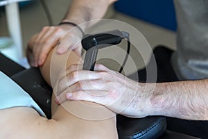 Physiotherapist doing Tecar therapy (Radio Frequency Transporter