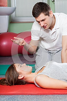 Physiotherapist giving advices to the female patient