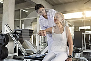 Physiotherapist helping old senior woman in physical center. elderly health lifestyle concept