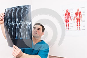 Physiotherapist, radiographer or doctor and x-ray photo