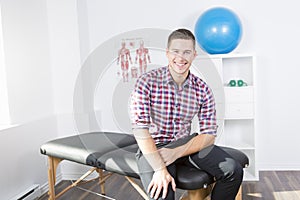 Physiotherapist rehabilitating at job photo