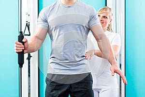 Physiotherapist working with patient in practice