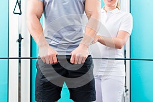 Physiotherapist working with patient in practice