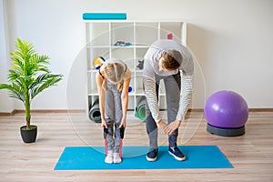 Physiotherapists working on rehabilitation