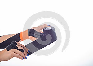 Physiotherapy for a diseased wrist. Alternative medicine. Adhesive tape for athletes with injuries. Support for an