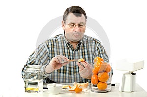 Phytocontrol expert measuring mandarine slice