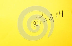 Pi day - pi sign is written with marker for holiday on March 14, on a yellow background, top view, copy space