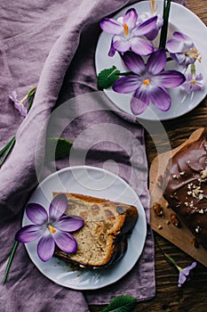 Piace of cake with flowers around and coffee photo