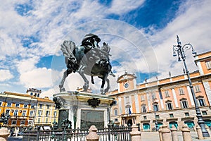 Piacenza, medieval town, Italy. Piazza Cavalli and monument at Alessandro Farnese, in the background the palazzo del Governatore