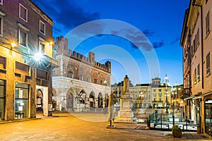 Piacenza, medieval town, Italy. Piazza Cavalli and palazzo Gotico in the city center on a beautiful day, at dusk