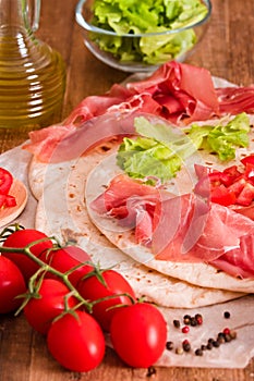 Piadina with ham and lettuce.