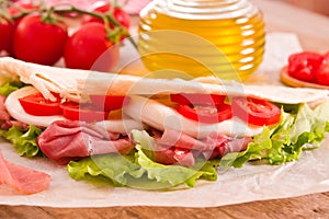 Piadina with ham and lettuce.