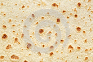 Piadina, italian tortilla texture background