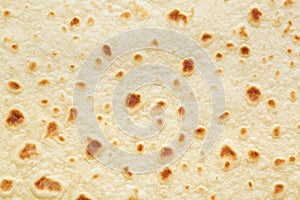 Piadina, italian tortilla texture background photo