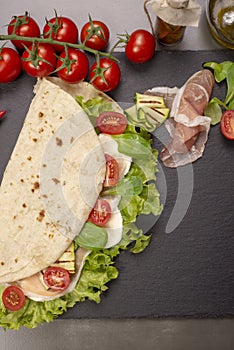 Piadina romagnola with cheese and ham