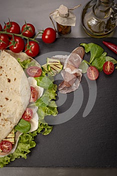 Piadina romagnola with cheese and ham