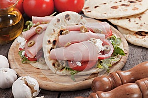 Piadina romagnola, italian flatbread sandwich photo