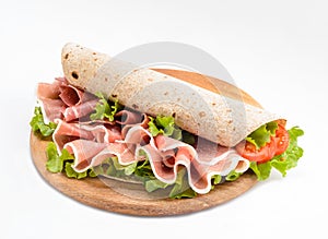 Piadina Romagnola stuffed with raw ham