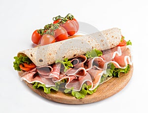 Piadina Romagnola stuffed with raw ham