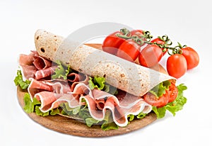 Piadina Romagnola stuffed with raw ham